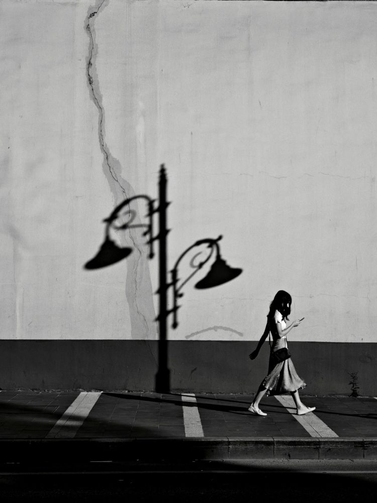 girlwalkingdownstreet