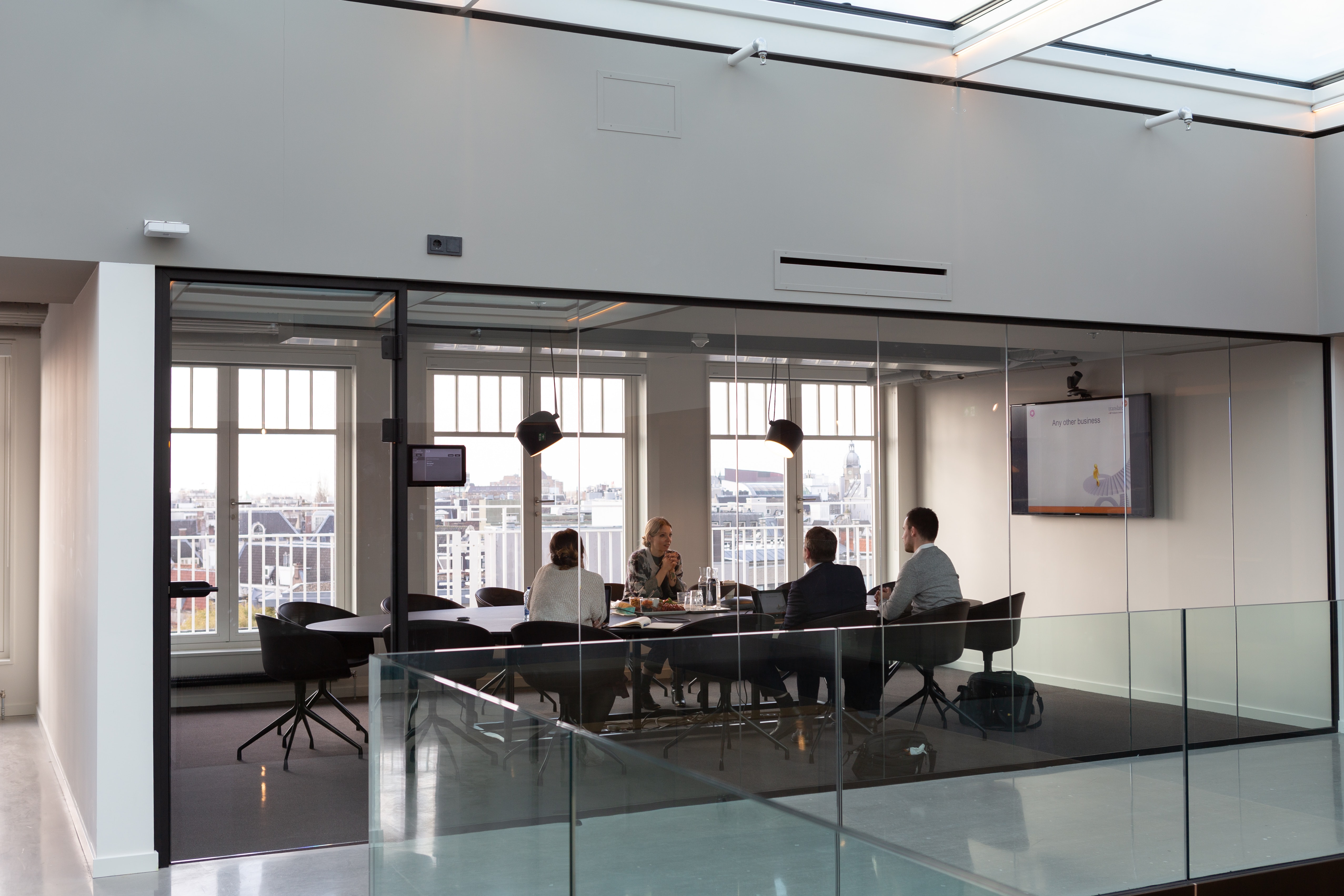 people sitting in a office room
