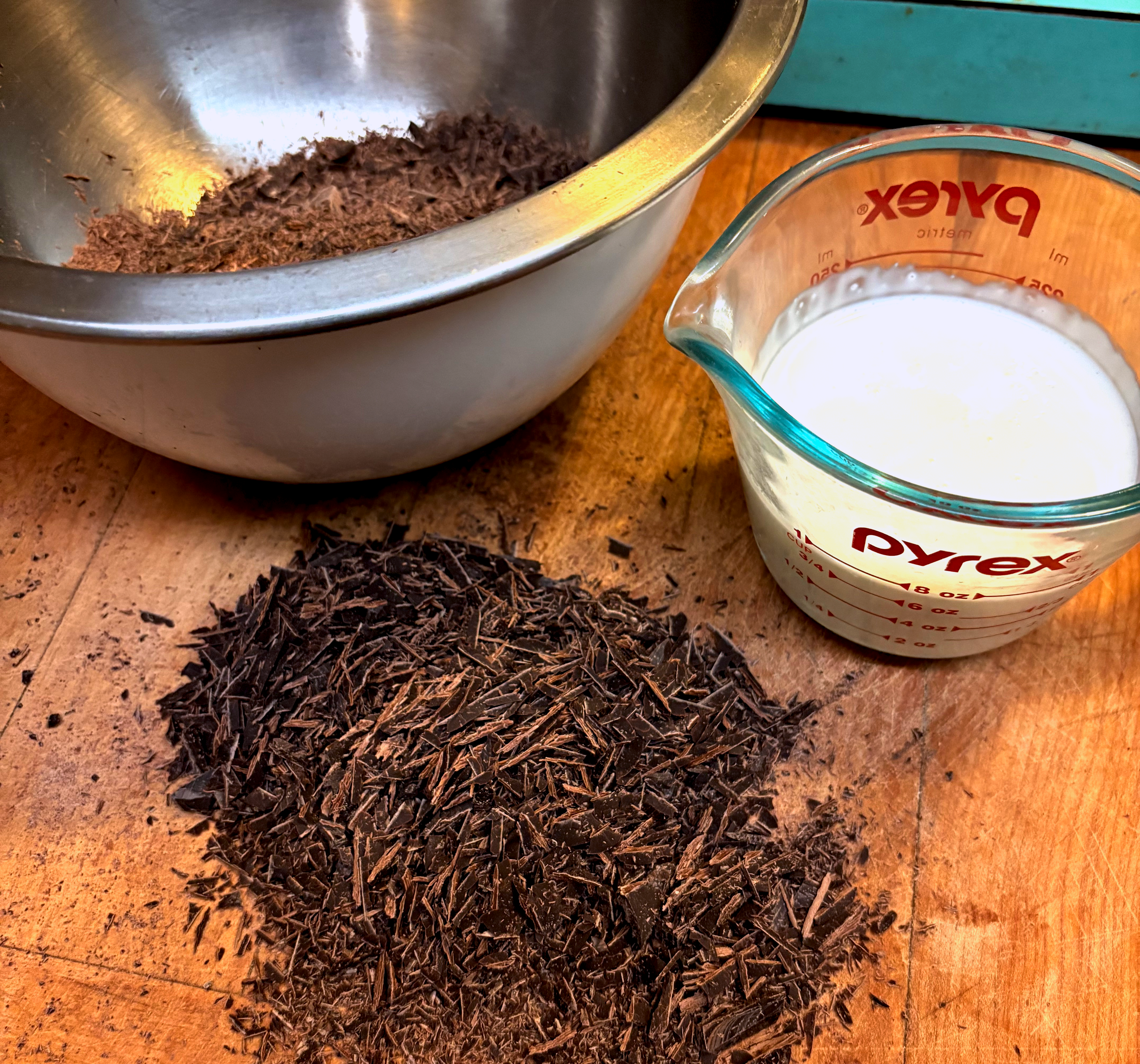 Chopped Dark Chocolate and Cream ready to be melted.