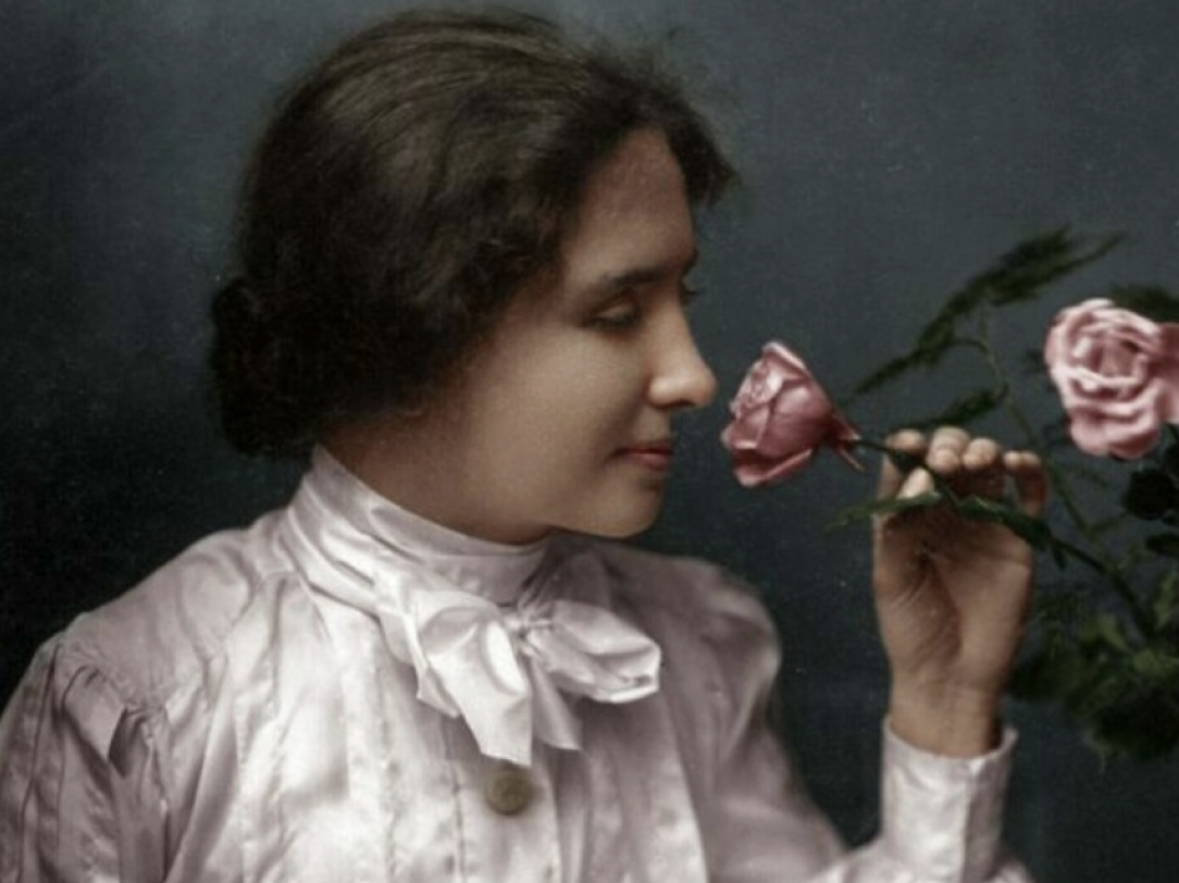 painting of Helen Keller with roses